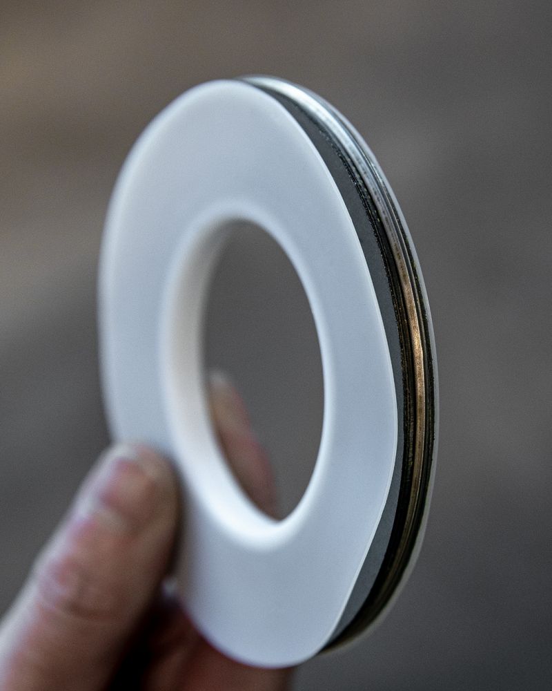 Hand holding an envelope gasket